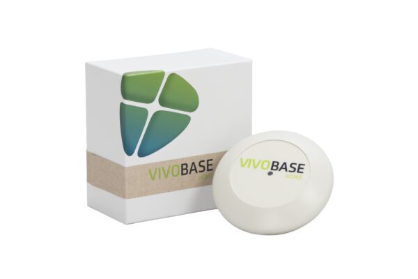 A white box with a green logo and a white ball.