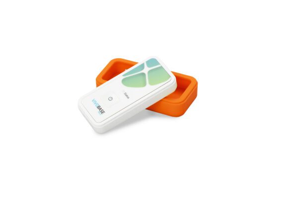 A remote control sitting in an orange case.